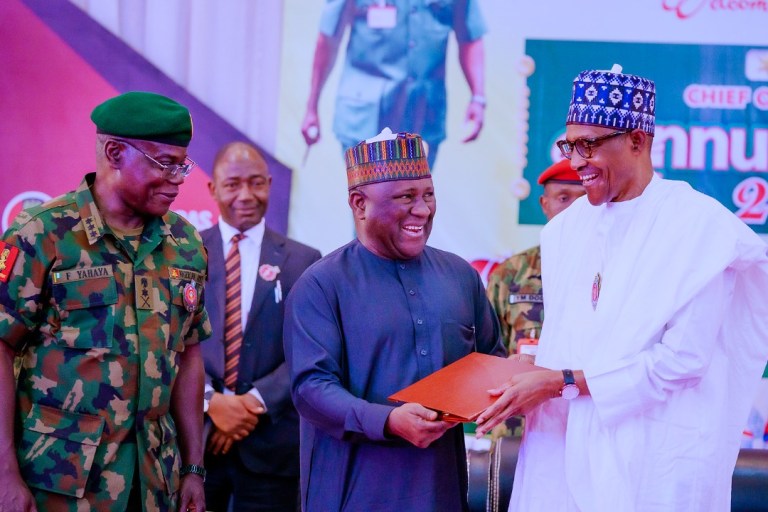Accolades As Buhari Presents Another Award To BUA Chairman, Abdulsamad Rabiu On Behalf Of Nigerian Military